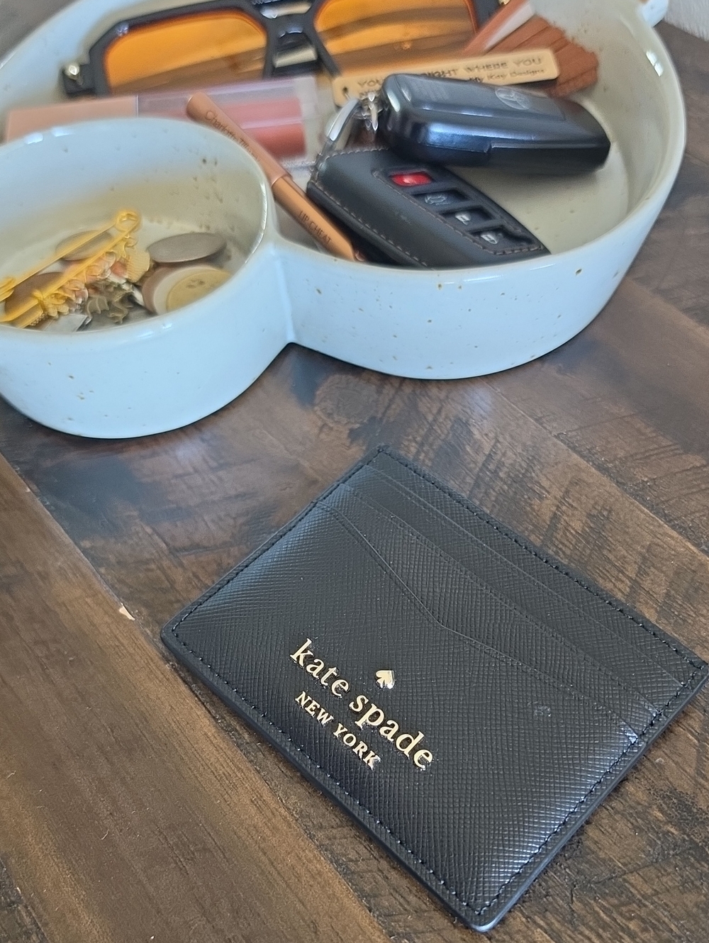 kate spade black leather slim card case with gold logo